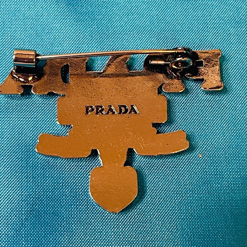 Prada Brooch Silver Logo Emblem Pin NIB